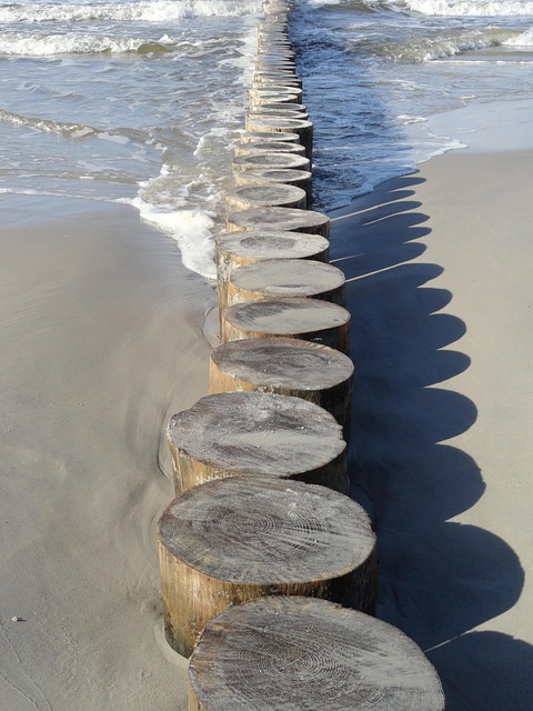 Wooden stepping stones out into the sea
