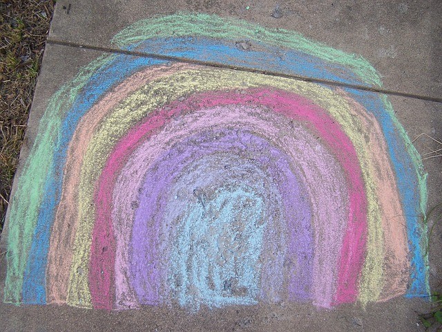 A rainbow made of chalk on a pavement